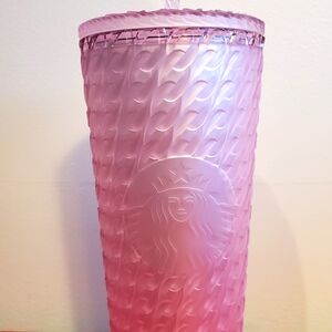 Tall BNWT Starbucks pale pink with matching straw.